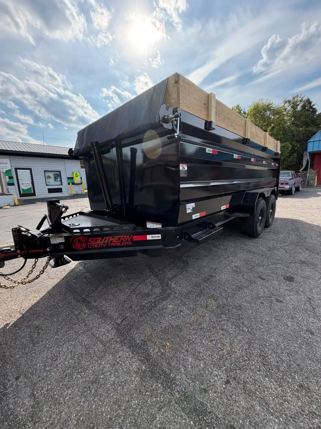 Phelps 20 yard dumpster trailer tarped and ready for delivery