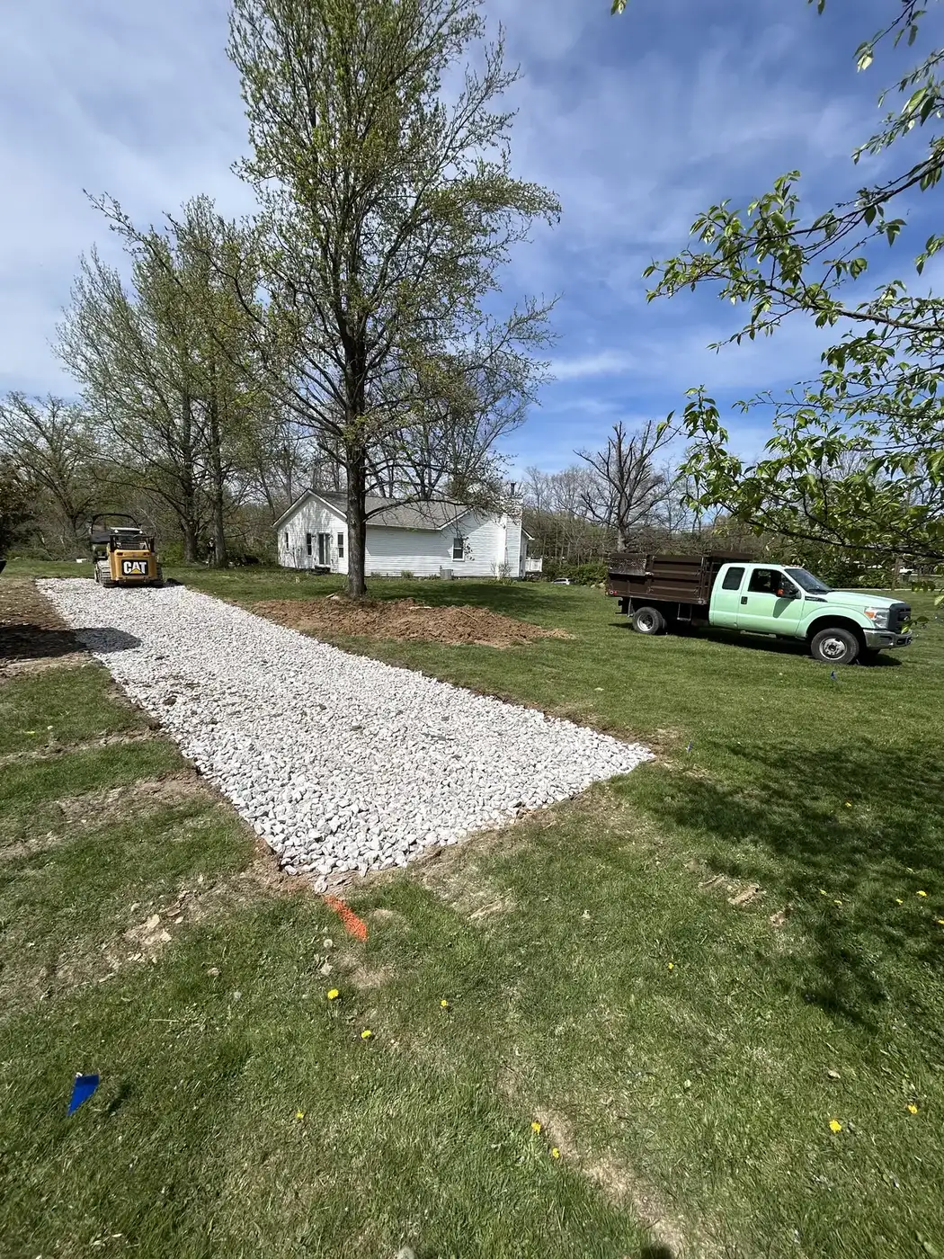 New gravel driveway strip installed by Phelps on a rural property